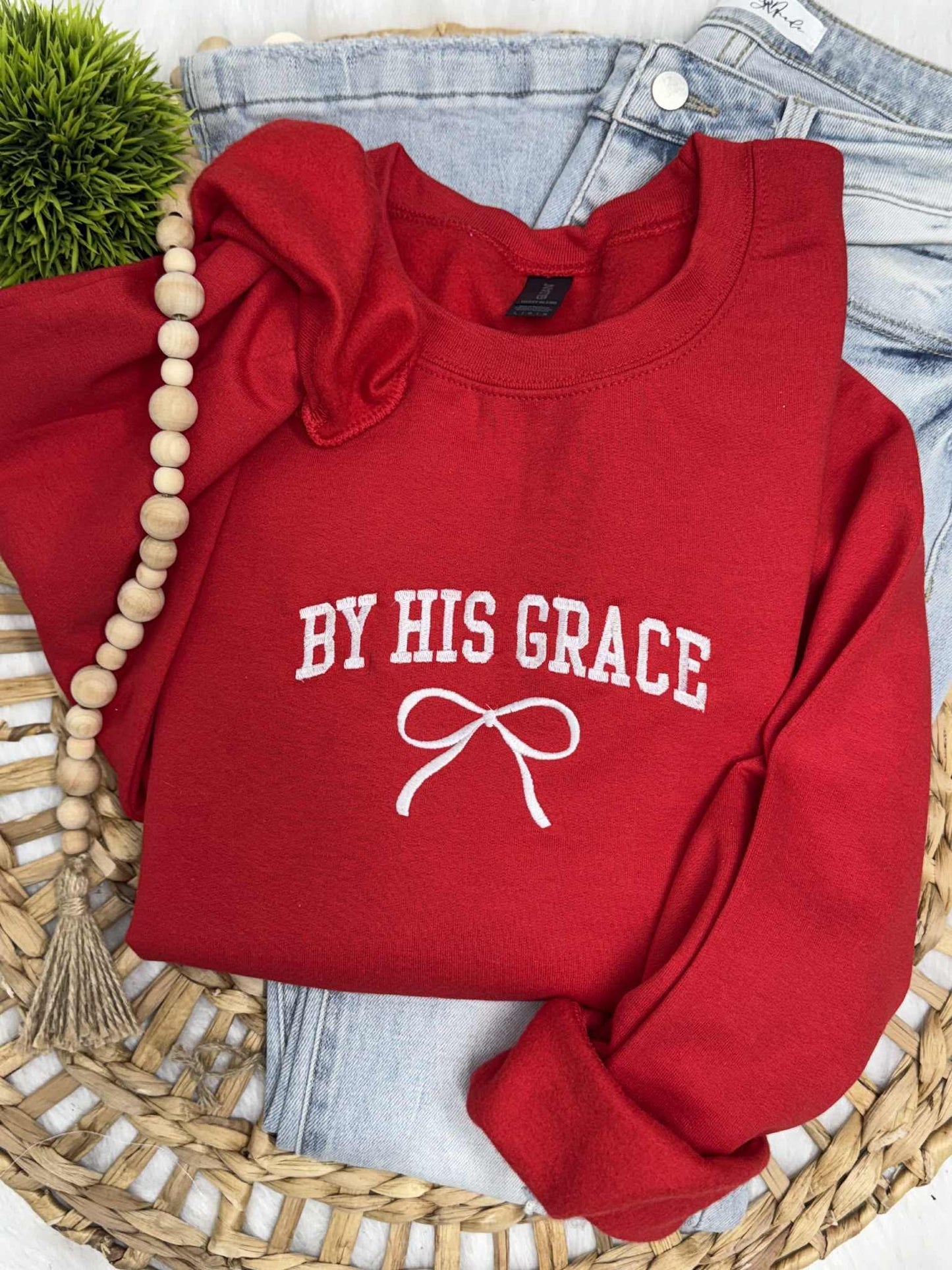 By His Grace